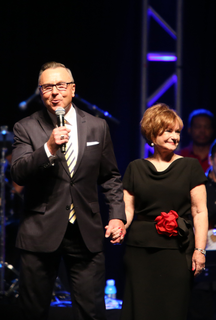 Bishop David Thomas of Victory Christian Center in Youngstown and wife, Pastor Kathie Thomas welcome attendees during the Meet Me at the Cross event at The Covelli Centre, Friday, April 14, 2017 in Youngstown. ..(Nikos Frazier | The Vindicator)..