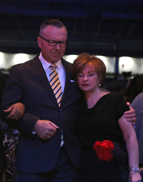Bishop David Thomas of Victory Christian Center in Youngstown and wife, Pastor Kathie Thomas pray as Bishop Joseph Garlington of Pittsburgh speaks during the Meet Me at the Cross event at The Covelli Centre, Friday, April 14, 2017 in Youngstown. ..(Nikos Frazier | The Vindicator)..
