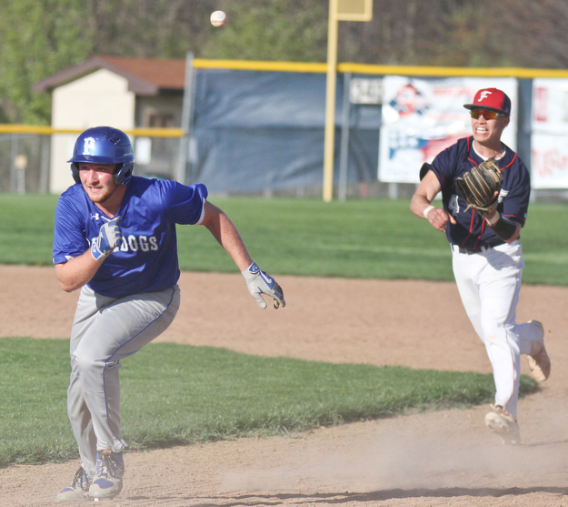 William D Lewis The Vindicator  Poland's Dan Klase(24) triew to elude Fitch's Kole Klasic(4) during a run down between 1rst and 2nd during 4-17-17 game at Fitch.