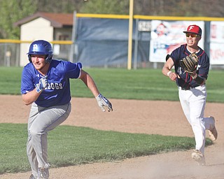 William D Lewis The Vindicator  Poland's Dan Klase(24) triew to elude Fitch's Kole Klasic(4) during a run down between 1rst and 2nd during 4-17-17 game at Fitch.
