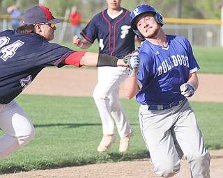 William D Lews The Vindicator  Fitch 1rst basemanRobby Russo(24) tags Poland's Dan Klase(24) during a run down between 1rst and 2nd during a 4-17-17 game q Fitch. in background is Fitch 's Kole Klasic(4). Fitch won 3-1.