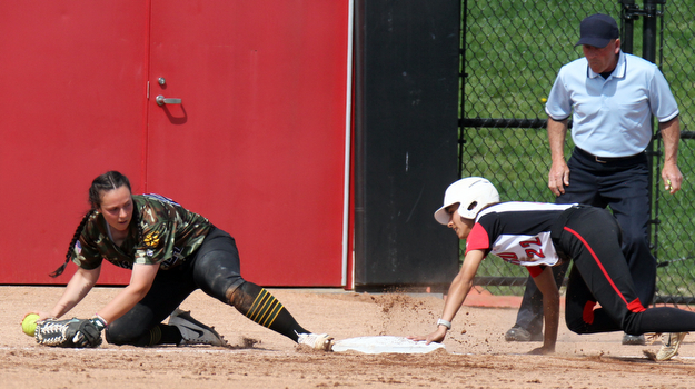 William D. Lewis The Vindicator  YSU's Hsnnah Lucas(22) is safe at 3rd a WSU's Libby Pfeffer(21) misses the throw during 4-18-17 game at YSU.
