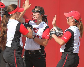 William D Lewis The Vindicator YSU pitcher Maddi Lusk(10),center, reacts with Kelly Thompson-Cappadocio(7), left, and Brittney Moffatt(2) during 4-18 win over WSU in first gme of a double header at YSU.