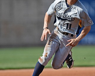 NILES, OHIO - APRIL 18, 2017: Kent State's Mason Mamarella (11) rounds third base to head home to score on a double by Dylan Rosa, not pictured, in the first inning of Tuesday evenings game at Eastwood Field. Kent State won 6-3. DAVID DERMER | THE VINDICATOR