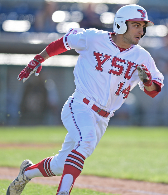 NILES, OHIO - APRIL 18, 2017: Youngstown State's Anthony Rohan (14) runs to first after hitting a single in the third inning of Tuesday evenings game at Eastwood Field. Kent State won 6-3. DAVID DERMER | THE VINDICATOR