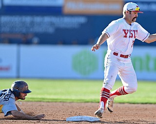 NILES, OHIO - APRIL 18, 2017: Youngstown State's Shane Willoughby, right, looks to the ball into his glove while stepping on second base to force out Kent State's Josh Hollander and turn a double play in the sixth inning of Tuesday evenings game at Eastwood Field. Kent State won 6-3. DAVID DERMER | THE VINDICATOR