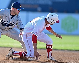 NILES, OHIO - APRIL 18, 2017: Youngstown State's Lorenzo Arcuri, right, steals second base after Kent State's Dom Iero, left, could not field the throw from the catcher in the sixth inning of Tuesday evenings game at Eastwood Field. Kent State won 6-3. DAVID DERMER | THE VINDICATOR