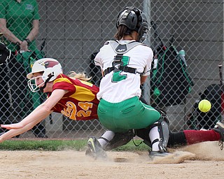 William D. Lewis The Vindicator  Mooney's Kelly Williams(24) is safe as WB catcher Bailey Byers(2) looses the ball at the plate during 4-19-17 action at Fields of Dreams.