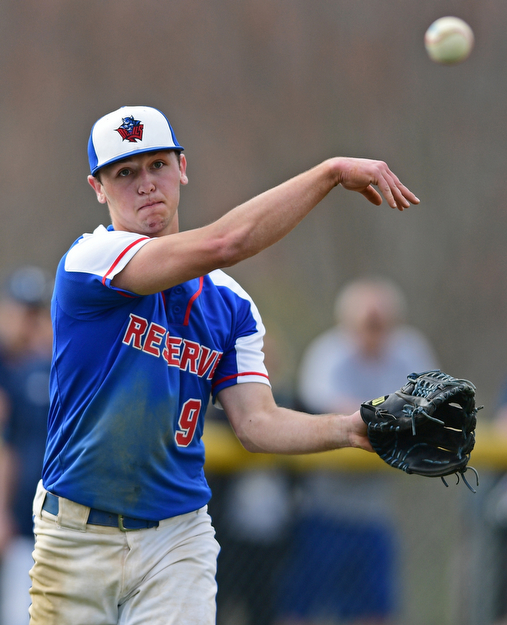 BERLIN CENTER, OHIO - APRIL 19, 2017: Western Reserve starting pitcher Wyatt Larimer (9) throws the ball to first for the out for the out after ground out by McDonald's Dylan Portolese, not pictured, in the second inning of Wednesday evenings game at Western Reserve High School. DAVID DERMER | THE VINDICATOR