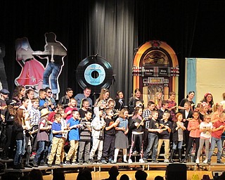 Neighbors | Alexis Bartolomucci.Fourth-grade Dobbins Elementary students danced along to the songs they sang during their Rocking through the Decades concert on March 14.
