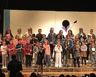 Neighbors | Alexis Bartolomucci.Some of the Dobbins students came up one by one to sing a solo for the song "Fight Song," by Rachel Platten for the Rocking through the Decades concert on March 14.