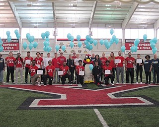 Neighbors | Alexis Bartolomucci.Members of Mahoning County Meals on Wheels partnered with Youngstown State University student-athletes to prepare for the balloon launch for the March for Meals on March 20.