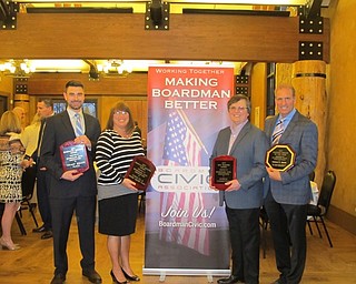 Neighbors | Alexis Bartolomucci.The award winners for the Boardman Civic Association's Community Awards Dinner held up their awards after the presentation on March 20. Pictured are, from left, John Mayo, Shelly LaBerto, John Straub and Tom Zidian.