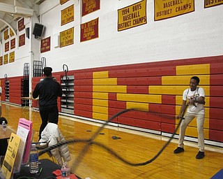 Neighbors | Alexis Bartolomucci.The YMCA allowed students to try the ropes and boxing during Yes Fest at Cardinal Mooney on March 22.