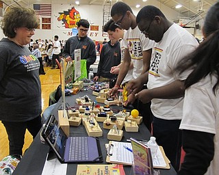 Neighbors | Alexis Bartolomucci.Cardinal Mooney tried using circuits that were provided by the Oh Wow Children's Museum on March 22 during Yes Fest.