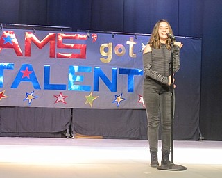 Neighbors | Alexis Bartolomucci.Alaina Protopapa sang "Demons" and signed along during the Austintown Middle School talent show on April 4.