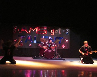 Neighbors | Alexis Bartolomucci.Austintown Middle School students Carter Cook, Jack Kovacs and Anthony Pittano formed "Blue Flare" and performed "7 Nation Army" for the talent show on April 4.