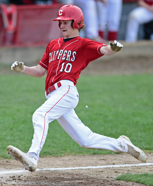 COLUMBIANA, OHIO - APRIL 20, 2017: Columbiana's Seth Ross (10) slides into home to score a run on a wild pitch by South Range starting pitcher Kelly Keenan, not pictured, in the second inning of Thursday evenings game at Firestone Park. Columbiana won 4-2. DAVID DERMER | THE VINDICATOR