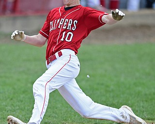 COLUMBIANA, OHIO - APRIL 20, 2017: Columbiana's Seth Ross (10) slides into home to score a run on a wild pitch by South Range starting pitcher Kelly Keenan, not pictured, in the second inning of Thursday evenings game at Firestone Park. Columbiana won 4-2. DAVID DERMER | THE VINDICATOR