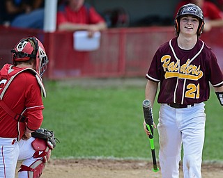 COLUMBIANA, OHIO - APRIL 20, 2017: South Range's Jack Baierski, right, walks to the dugout in disbelief after striking out looking in the third inning of Thursday evenings game at Firestone Park. Columbiana won 4-2. DAVID DERMER | THE VINDICATOR..Columbiana's Keenan Green (8) pictured.