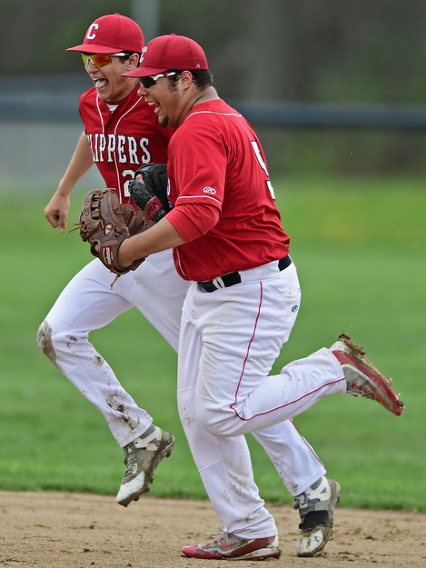 COLUMBIANA, OHIO - APRIL 20, 2017: Columbiana's Vince Vivo, left, and Tim Davin, right, celebrate after Vivo caught the ball to end the fourth inning of Thursday evenings game at Firestone Park. Columbiana won 4-2. DAVID DERMER | THE VINDICATOR