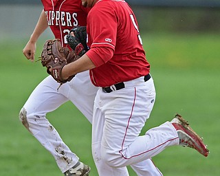 COLUMBIANA, OHIO - APRIL 20, 2017: Columbiana's Vince Vivo, left, and Tim Davin, right, celebrate after Vivo caught the ball to end the fourth inning of Thursday evenings game at Firestone Park. Columbiana won 4-2. DAVID DERMER | THE VINDICATOR