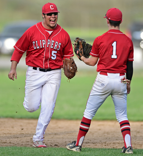 COLUMBIANA, OHIO - APRIL 20, 2017: Columbiana's Tim Davin, left, celebrates with Chase Franken after catching the ball for the final out to end the game, Thursday evening at Firestone Park. Columbiana won 4-2. DAVID DERMER | THE VINDICATOR
