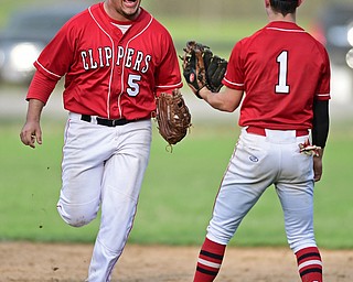 COLUMBIANA, OHIO - APRIL 20, 2017: Columbiana's Tim Davin, left, celebrates with Chase Franken after catching the ball for the final out to end the game, Thursday evening at Firestone Park. Columbiana won 4-2. DAVID DERMER | THE VINDICATOR