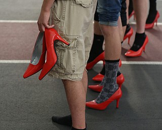 during a Walk a Mile in Her Shoes at the Watts and Tressel Training Site at Youngstown State University, Friday, April 21, 2017 in Youngstown. ..(Nikos Frazier | The Vindicator)..
