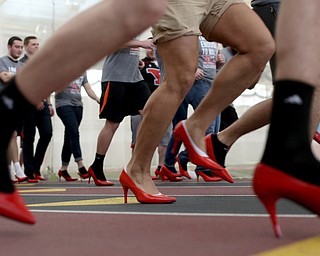 And they're off during a Walk a Mile in Her Shoes at the Watts and Tressel Training Site at Youngstown State University, Friday, April 21, 2017 in Youngstown. ..(Nikos Frazier | The Vindicator)..