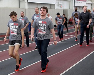 Tom Kuhns(left) and Jay King(right) Walk a Mile in Her Shoes at the Watts and Tressel Training Site at Youngstown State University, Friday, April 21, 2017 in Youngstown. ..(Nikos Frazier | The Vindicator)..