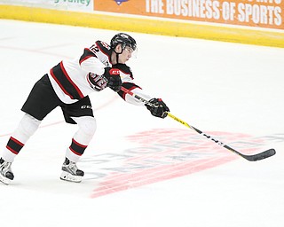 Chicago Steel defenseman Ben Mirageas (12) shoots during the 1st period as the Chicago Steel takes on the Youngstown Phantoms in the USHL Eastern Conference Semifinals, Friday, April 21, 2017 at The Covelli Centre...(Nikos Frazier | The Vindicator)..