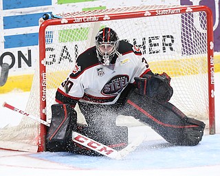 Chicago Steel goalie Ales Stezka (30) watches a puck fly by during the 1st period as the Chicago Steel takes on the Youngstown Phantoms in the USHL Eastern Conference Semifinals, Friday, April 21, 2017 at The Covelli Centre...(Nikos Frazier | The Vindicator)..