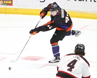 Youngstown Phantoms left wing Coale Norris (44) puts a shot on goal during the 2nd period as the Chicago Steel takes on the Youngstown Phantoms in the USHL Eastern Conference Semifinals, Friday, April 21, 2017 at The Covelli Centre...(Nikos Frazier | The Vindicator)..