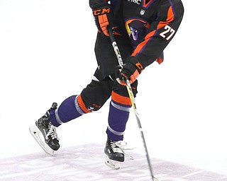 Youngstown Phantoms defenseman Michael Karow (27) puts a shot on goal during the 2nd period as the Chicago Steel takes on the Youngstown Phantoms in the USHL Eastern Conference Semifinals, Friday, April 21, 2017 at The Covelli Centre...(Nikos Frazier | The Vindicator)..