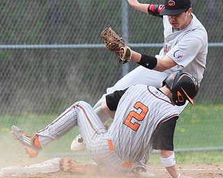 William D Lewis The Vindiactor  Howland's  Zachary Campbell(2) is out at 3rd after being tagged by Girard's Nick DeGregory(6) during 4-21-17 action at Howland.