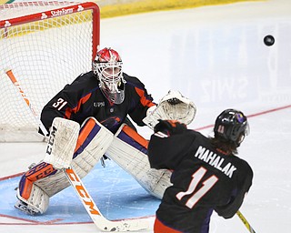 Youngstown Phantoms goalie Ivan Kulbakov (31) looks up at the puck after Youngstown Phantoms defenseman Alec Mahalak (11) knocked it into the air to keep it away from the Steel during the 3rd period as the Chicago Steel takes on the Youngstown Phantoms in Game 4 of the USHL Eastern Conference Semifinals, Saturday, April 22, 2017 at The Covelli Centre in Youngstown. The Phantoms won 3-2...(Nikos Frazier | The Vindicator)..
