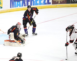 Chicago Steel left wing Eduards Tralmaks (14) shoots into the net for a goal against Youngstown Phantoms goalie Ivan Kulbakov (31) during the 3rd period as the Chicago Steel takes on the Youngstown Phantoms in Game 4 of the USHL Eastern Conference Semifinals, Saturday, April 22, 2017 at The Covelli Centre in Youngstown. The Phantoms won 3-2...Youngstown Phantoms defenseman Brandon Estes (22)..(Nikos Frazier | The Vindicator)..