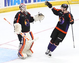 Youngstown Phantoms forward Austin Pooley (12) celebrates their victory after winning 3-2 against the Chicago Steel in Game 4 of the USHL Eastern Conference Semifinals, Saturday, April 22, 2017 at The Covelli Centre in Youngstown. With the series tied, 2-2, Game 5 will be played in Chicago on Tuesday...(Nikos Frazier | The Vindicator)..