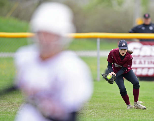 BOARDMAN, OHIO - APRIL 22, 2017: Boardman's Vanessa Roush, right, fields the ball as Mooney's Lauren Frommelt reaches third in the third inning of Saturday mornings game at Boardman High School. DAVID DERMER | THE VINDICATOR