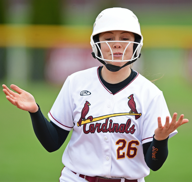 BOARDMAN, OHIO - APRIL 22, 2017: Mooney's Conchetta Rinaldi shrugs her shoulders while running the bases after blasting a grand slam in the third inning of Saturday mornings game at Boardman High School. DAVID DERMER | THE VINDICATOR