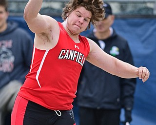 AUSTINTOWN, OHIO - APRIL 22, 2017: Canfield's Jarod Tincher throws during the boys shot put, Saturday afternoon during the Mahoning Country Track Meet at Austintown Fitch High School. DAVID DERMER | THE VINDICATOR