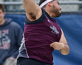 AUSTINTOWN, OHIO - APRIL 22, 2017: Boardman's George Wallace throws during the boys shot put, Saturday afternoon during the Mahoning Country Track Meet at Austintown Fitch High School. DAVID DERMER | THE VINDICATOR