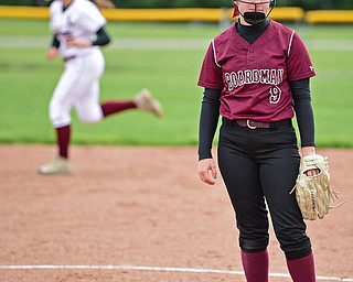 BOARDMAN, OHIO - APRIL 22, 2017: Boardman starting Ashley Cornelius, front, shows her frustration while looking into the dugout after allowing a grand slam to Mooney's Conchetta Rinaldi in the third inning of Saturday mornings game at Boardman High School. DAVID DERMER | THE VINDICATOR