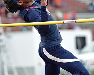 AUSTINTOWN, OHIO - APRIL 22, 2017: Fitch's DEONDRE McKEEVER jumps over the bar during the boys high jump, Saturday afternoon during the Mahoning Country Track Meet at Austintown Fitch High School. DAVID DERMER | THE VINDICATOR