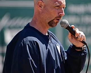 YOUNGSTOWN, OHIO - APRIL 23, 2017: President Ken Goss speaks at the microphone during the Mill Creek Junior Baseball opening ceremonies, Sunday afternoon at the Mill Creek baseball field complex. DAVID DERMER | THE VINDICATOR