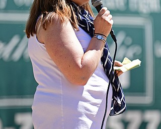 YOUNGSTOWN, OHIO - APRIL 23, 2017: Youngstown 5th ward council woman Lauren McNally speaks at the microphone during the Mill Creek Junior Baseball opening ceremonies, Sunday afternoon at the Mill Creek baseball field complex. DAVID DERMER | THE VINDICATOR