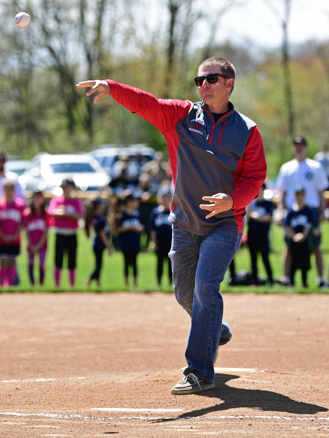 YOUNGSTOWN, OHIO - APRIL 23, 2017: YSU baseball head coach Dan Bertolini throws out the ceremonial first pitch during the Mill Creek Junior Baseball opening ceremonies, Sunday afternoon at the Mill Creek baseball field complex. DAVID DERMER | THE VINDICATOR