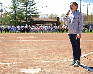 YOUNGSTOWN, OHIO - APRIL 23, 2017: Michaylen Lewis sings the national anthem during the Mill Creek Junior Baseball opening ceremonies, Sunday afternoon at the Mill Creek baseball field complex. DAVID DERMER | THE VINDICATOR
