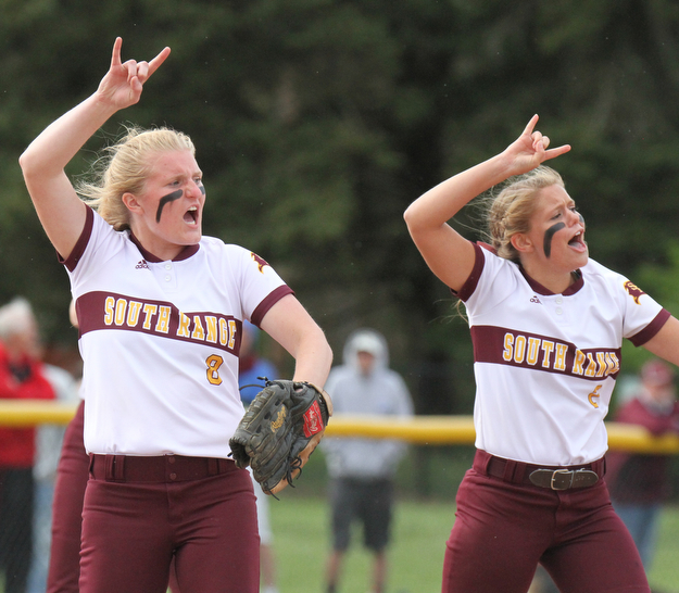 William D Lewis The Vindicator South Range's MAdison Weaver(8) and Lydia Baird(2) react during win over Springfield  4-24-17.